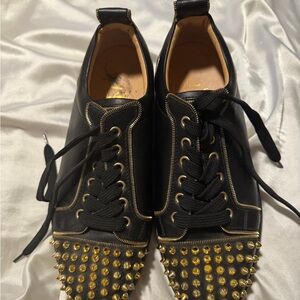 Christian Louboutin Black and Gold Studded Sneakers